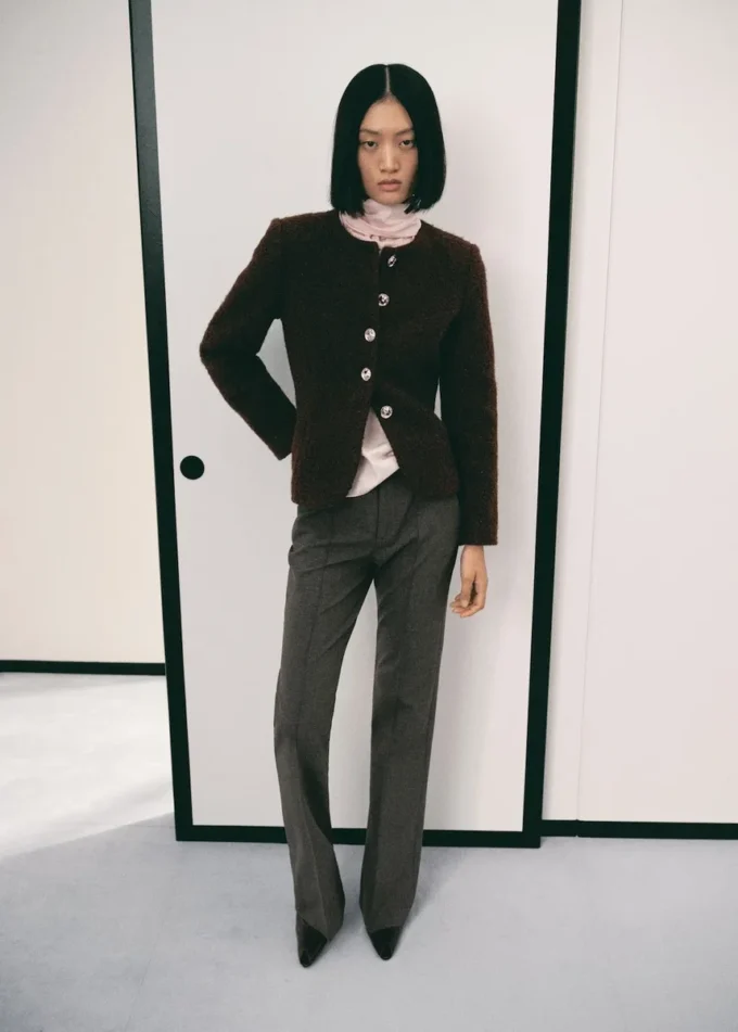 Veste bouclée avec boutons bijoux
