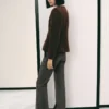 Veste bouclée avec boutons bijoux