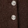 Veste bouclée avec boutons bijoux