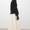 Veste à col montant et boutons bijoux