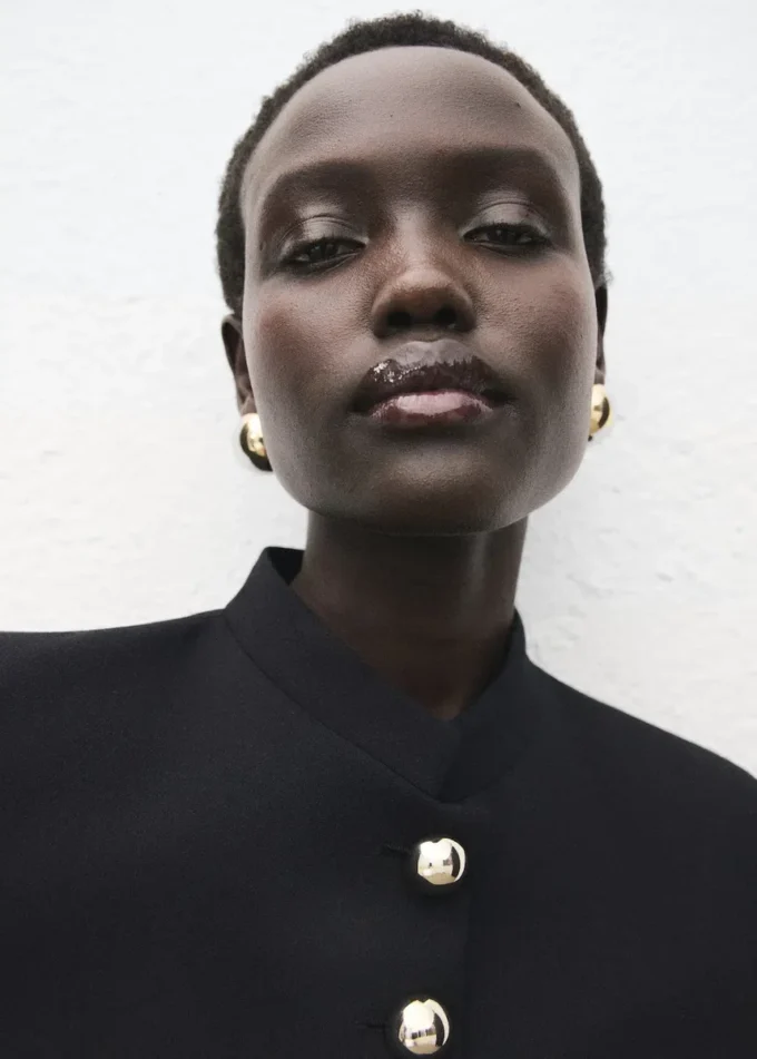 Veste à col montant et boutons bijoux