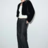 Veste courte en fausse fourrure