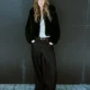 Veste courte en fausse fourrure