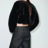 Veste courte en fausse fourrure