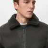 Veste double face avec détails en peau de mouton