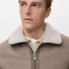 Veste double face avec détails en peau de mouton