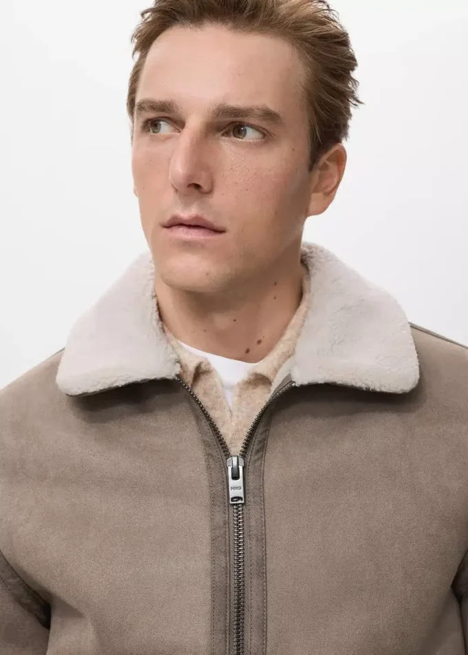 Veste double face avec détails en peau de mouton