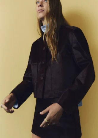 Veste en cuir avec poches en fourrure