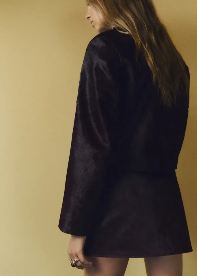 Veste en cuir avec poches en fourrure