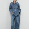 Veste en denim ajustée avec poches