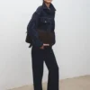Veste en denim ajustée avec poches