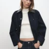 Veste en denim avec col en simili cuir