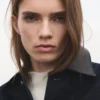 Veste en denim avec col en simili cuir