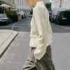 Veste en maille avec ceinture et boucle