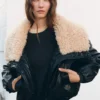 Veste en simili cuir avec col en peau lainée