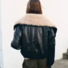 Veste en simili cuir avec col en peau lainée