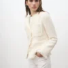 Veste en tweed avec bords effilochés