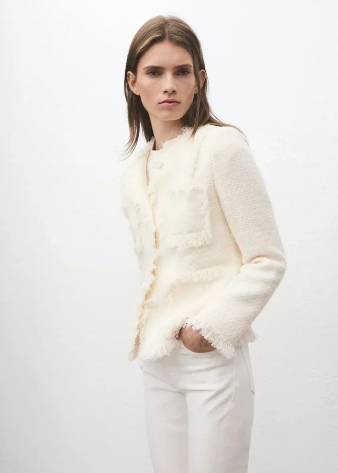 Veste en tweed avec bords effilochés