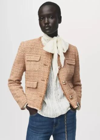 Veste en tweed avec bords effilochés
