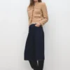 Veste en tweed avec bords effilochés