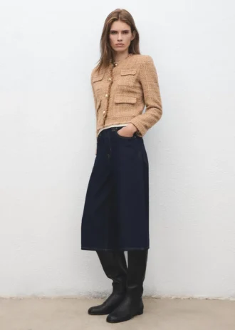 Veste en tweed avec bords effilochés