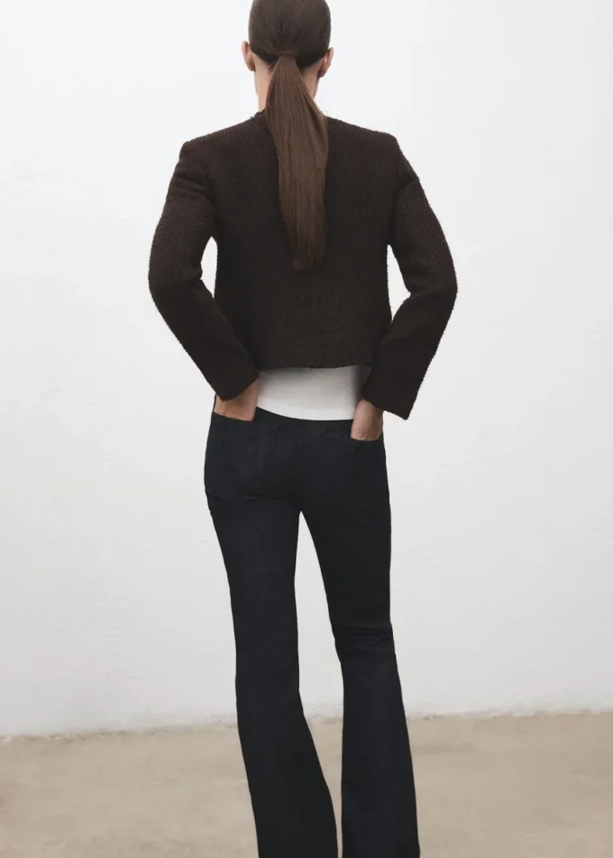Veste en tweed avec bords effilochés
