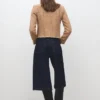Veste en tweed avec bords effilochés