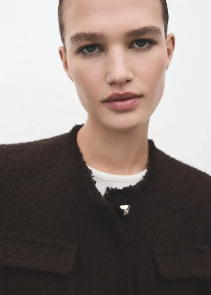 Veste en tweed avec bords effilochés