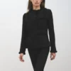 Veste en tweed avec bords effilochés