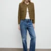 Veste en tweed avec boutons bijoux
