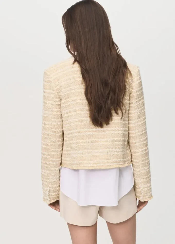 Veste en tweed avec boutons bijoux