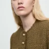 Veste en tweed avec boutons bijoux
