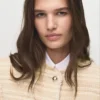 Veste en tweed avec boutons bijoux