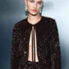 Veste en velours avec paillettes et nœud
