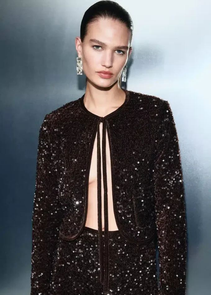Veste en velours avec paillettes et nœud
