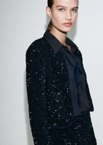 Veste en velours avec paillettes et nœud