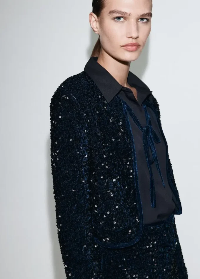 Veste en velours avec paillettes et nœud
