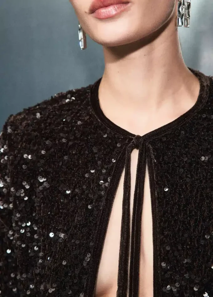 Veste en velours avec paillettes et nœud